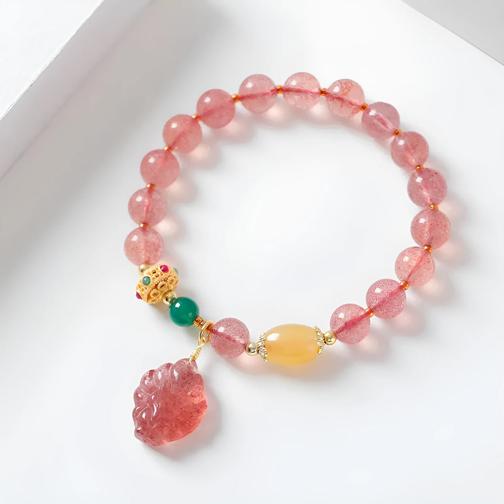 Women's strawberry quartz crystal bracelet with nine tail fox bead design