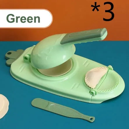 Orange and white plastic manual dumpling maker tool with press and mould.