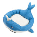 Blue duck-shaped fluffy pet bed for a small dog, showing raised rim and soft material.