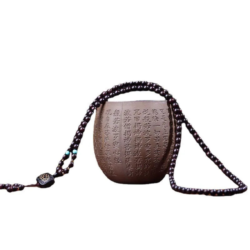 Zambia rosewood Buddha beads bracelet with 0.6 cm beads and flat lotus pendant on wooden surface