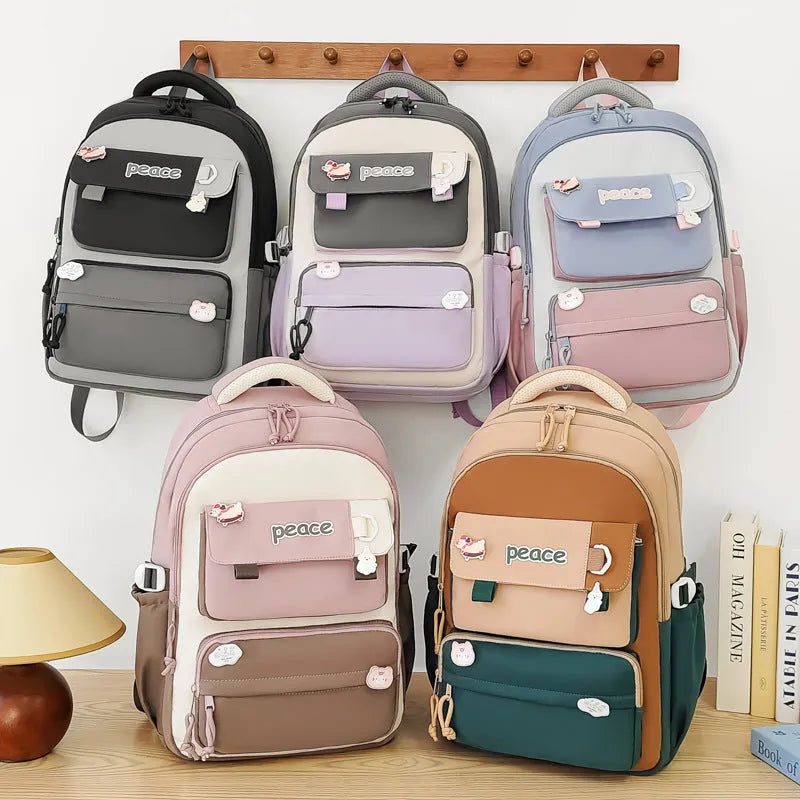 Women's large capacity nylon schoolbag 29x45x17cm with letter pattern, available in grey, khaki, purple, black, and blue