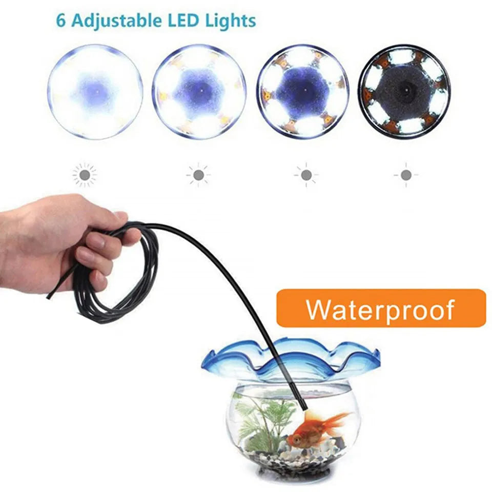 USB-C endoscope with flexible cable, HD camera, magnet, hook, and side mirror attachments on a table.