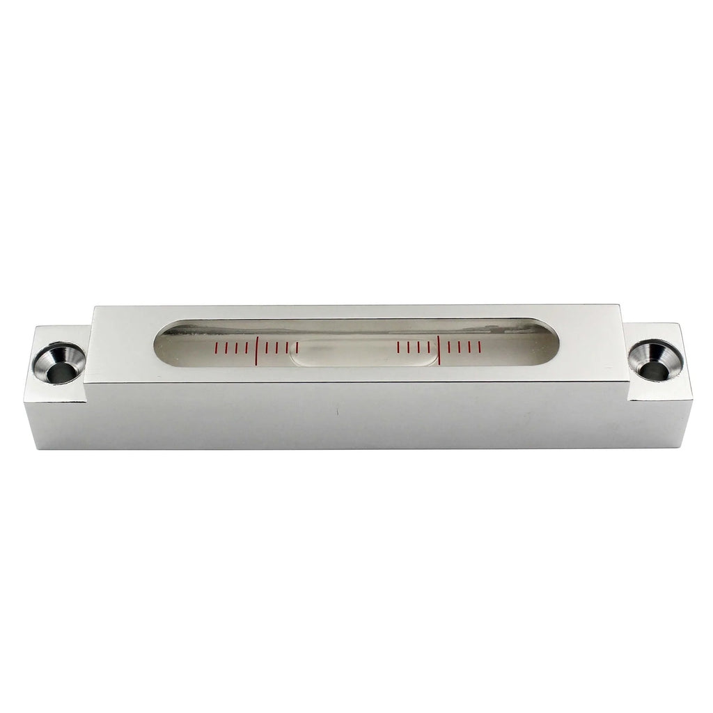 Metal and glass mini strip level showing precision vial on a 132mm long ruler.