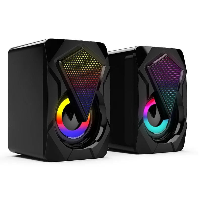 X2 RGB USB desktop multimedia speaker pair with extra bass, wired connection, and colourful lighting on a desk