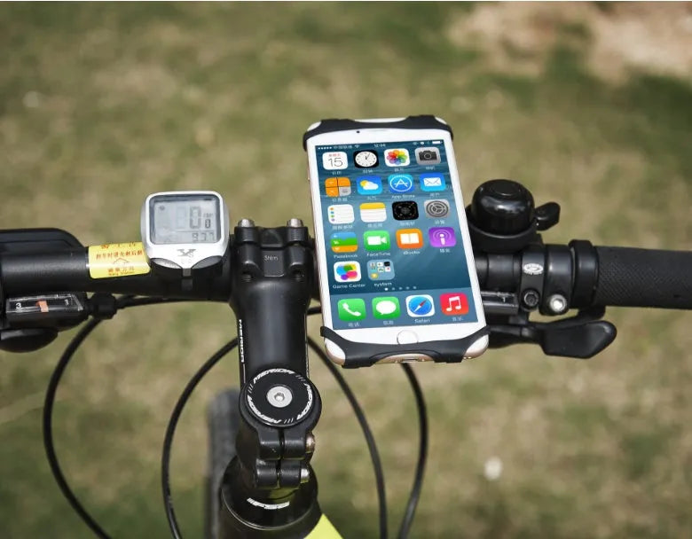 Silicone bicycle phone holder mounted on handlebar with three adjustment holes visible