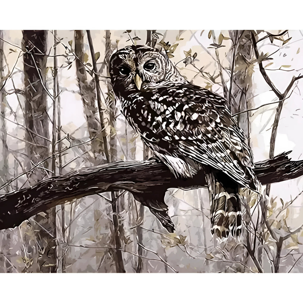 Owl digital painting kit showing canvas, acrylic paints, and brushes on a table