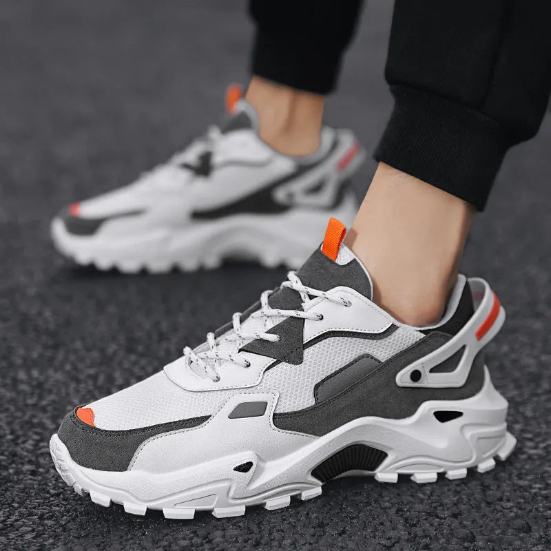 Men's breathable casual sneakers in black white colour-blocked pattern with lace-up front