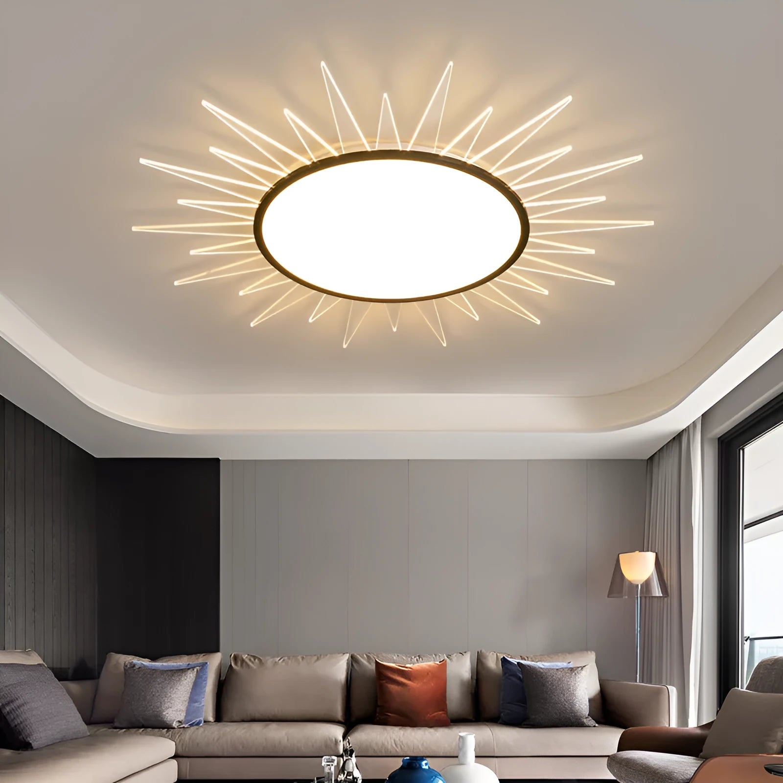 Round modern aluminium LED ceiling lamp with remote control for dimming and light colour selection.