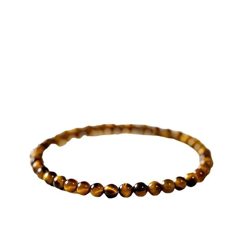 Handmade new Chinese style tigereye geometric round bead bracelet showing natural banding patterns