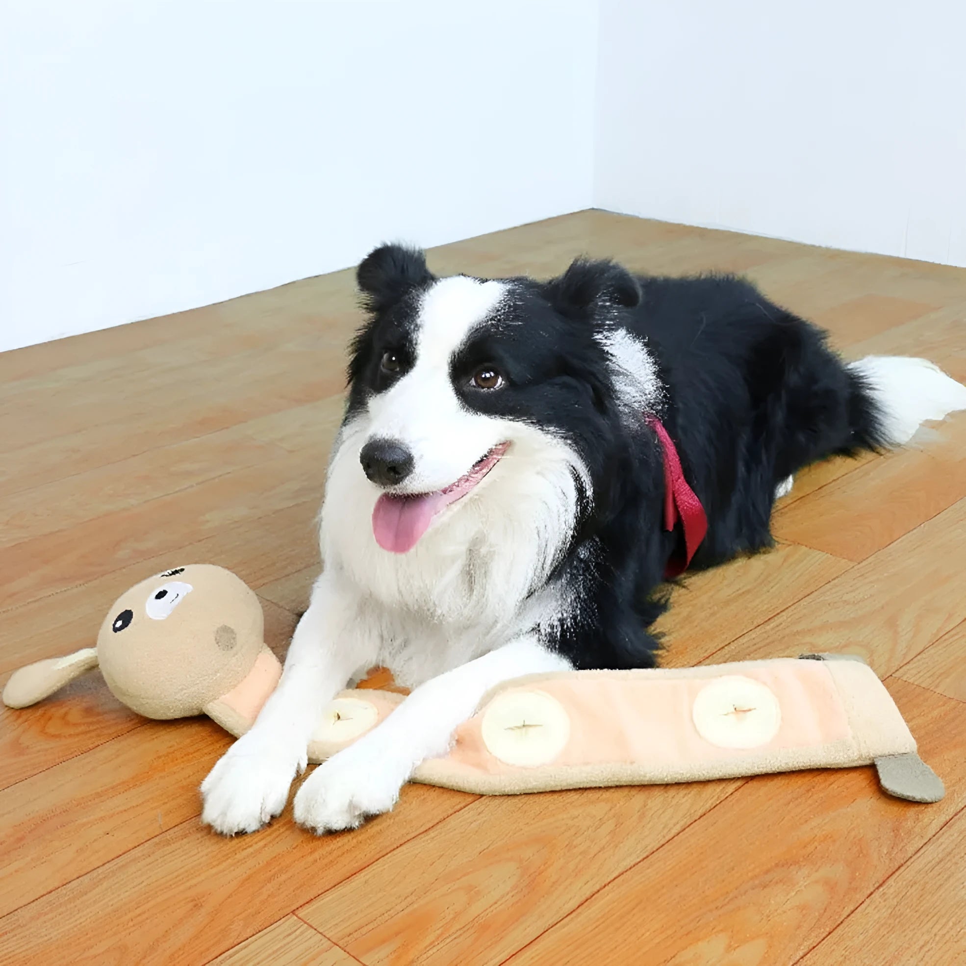 Plush fleece rabbit dog snuffle toy with treat compartments and squeaker, shown on a white background.