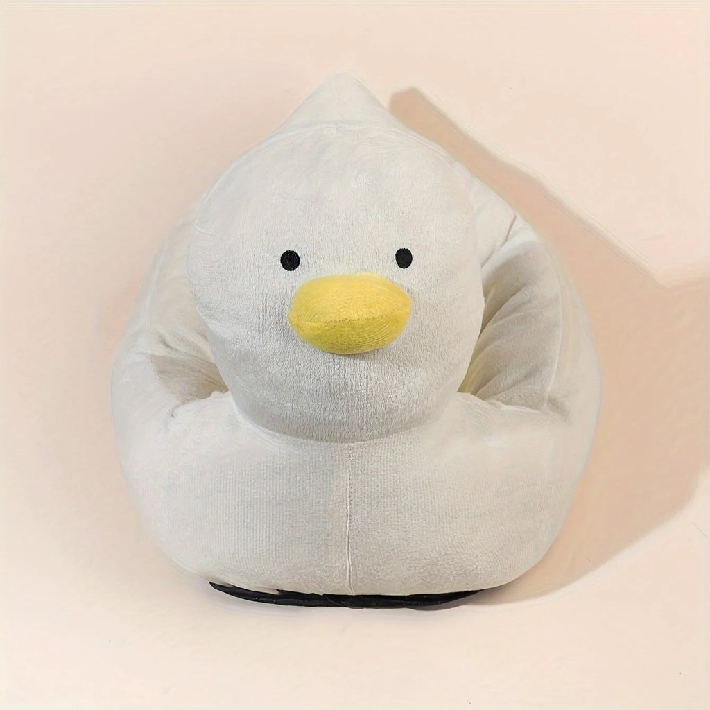 Blue duck-shaped fluffy pet bed for a small dog, showing raised rim and soft material.