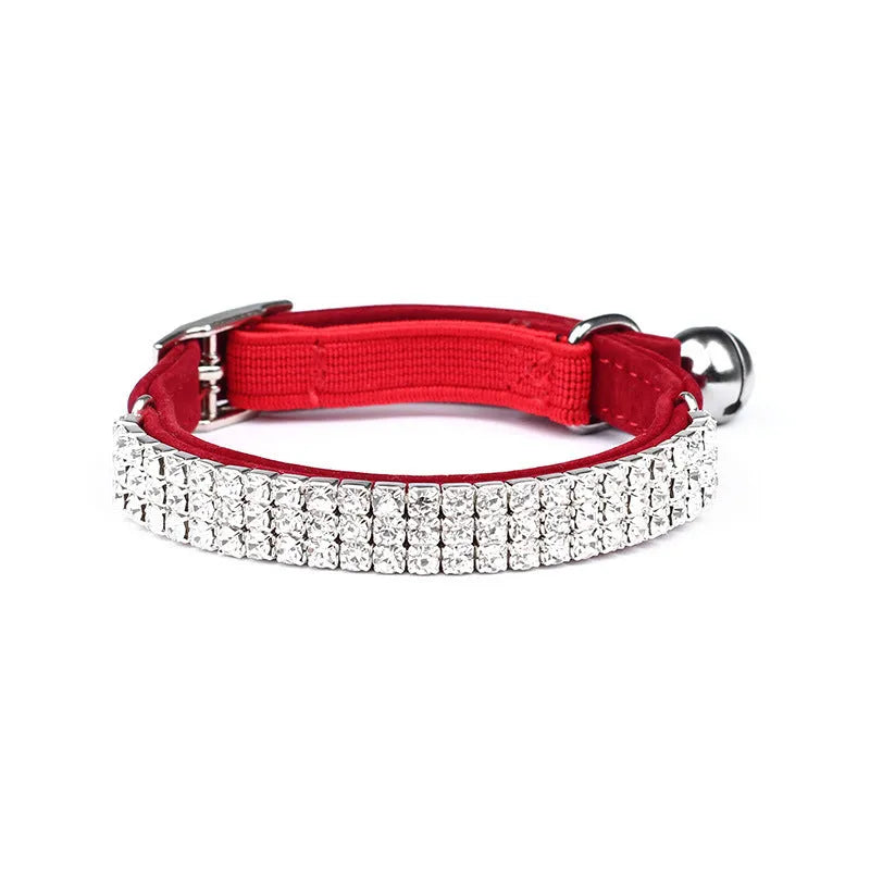 Velvet cat collar with rhinestones in red, blue, purple, black, or pink, showing adjustable buckle.