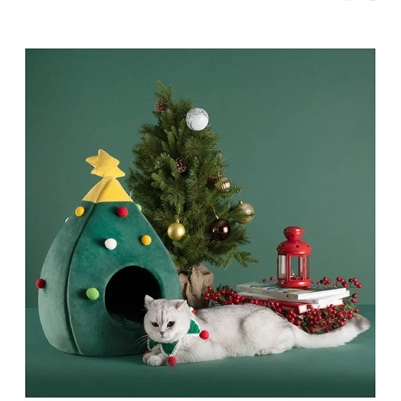 Red Christmas tree shaped plush cave bed for a cat or small dog on a wooden floor