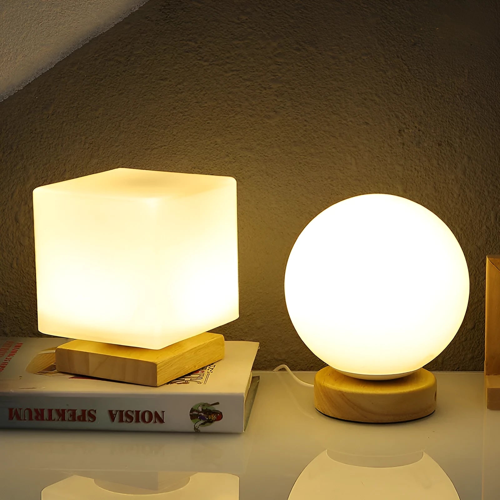 Nordic style solid wood USB table lamp in a cube shape with touch dimming on a wooden desk.