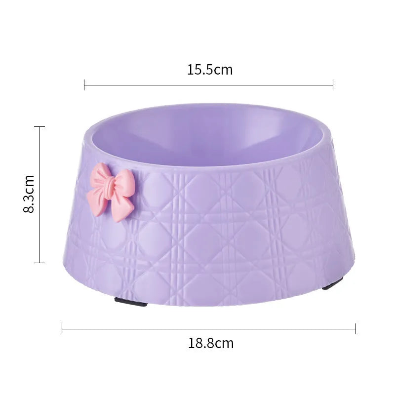 Pet food bowl with diamond pattern and bowknot decoration in black, purple or white with pink or silver bow