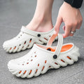 Men's beige EVA slipper sandals with hole design and non-slip sole.