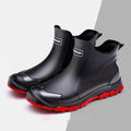 Men's short PVC rubber boots in beige with a flat heel and non-slip sole.
