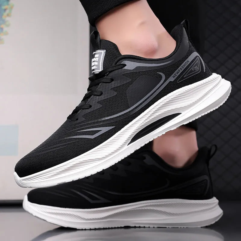 Men's Fly Woven Mesh casual shoes in grey and green, showing low-top design and rubber sole.