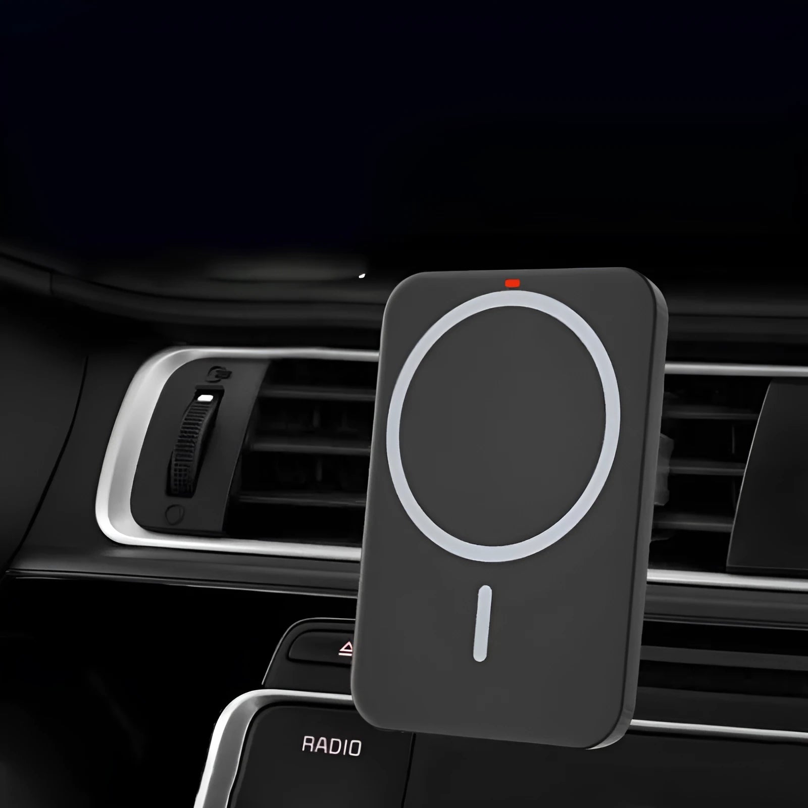 Black car magnetic wireless charger bracket mounted on car air vent with phone attached