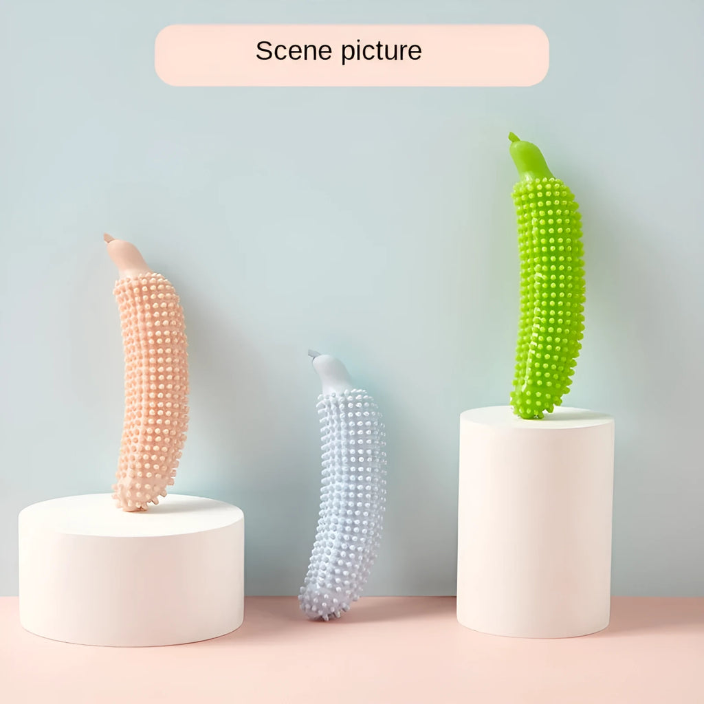 Green rubber dog teething chew toy with cucumber-like shape