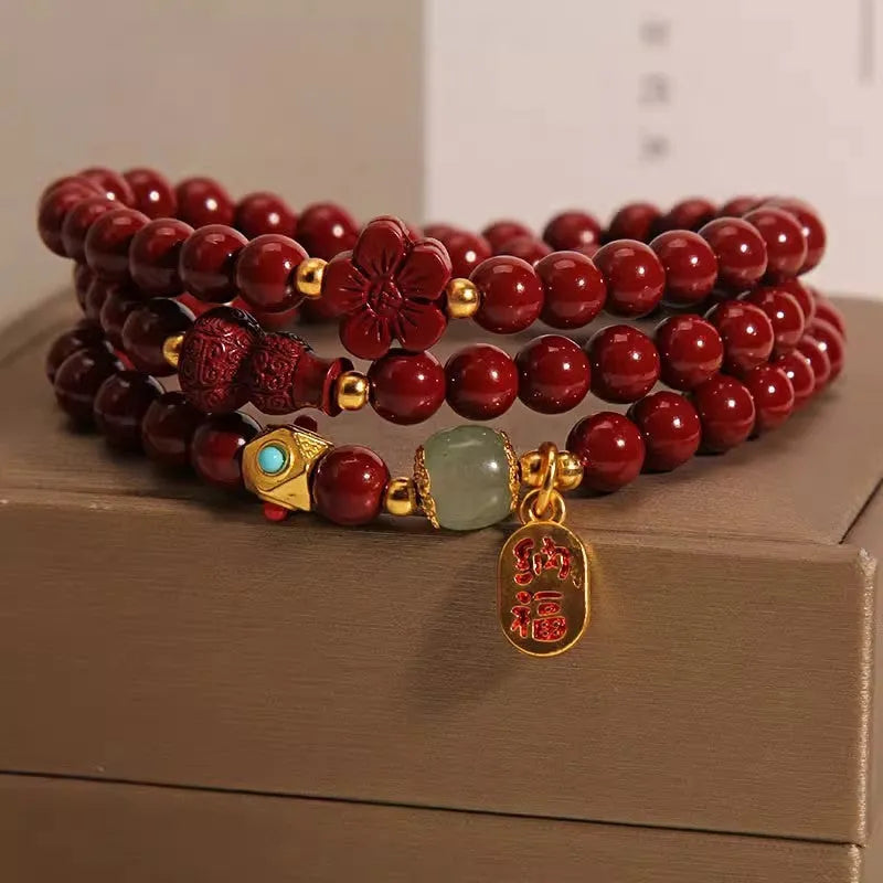 Women's multi-circle cinnabar bracelet with gourd and five petal flower design