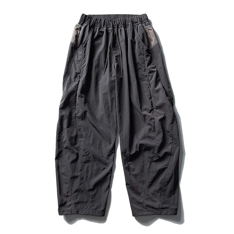 Fleece-lined quick-dry paratrooper cargo pants in army green with cargo pockets and adjustable cuffs