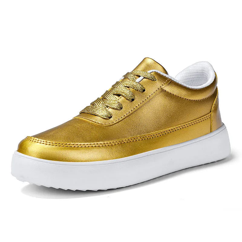 Women's white leather lace-up casual flat shoes on a plain background.
