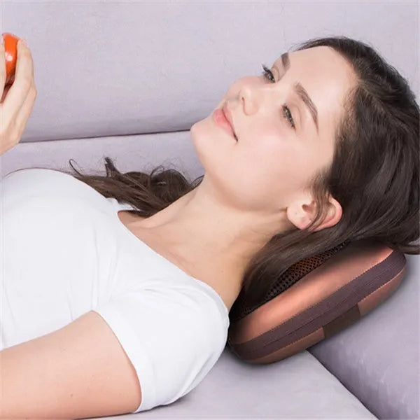Electric neck massage pillow, coffee colour, 33x29x11cm, with infrared therapy and kneading rollers for home and car use.