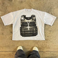 Printed short-sleeve cotton t-shirt with drop-shoulder sleeves and a contrast colour graphic on the front.