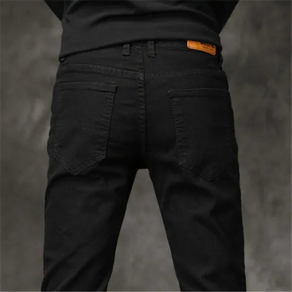 Black slim-fit stretch men's cotton pants, tight cut, sizes 27 to 36 with full cm size chart