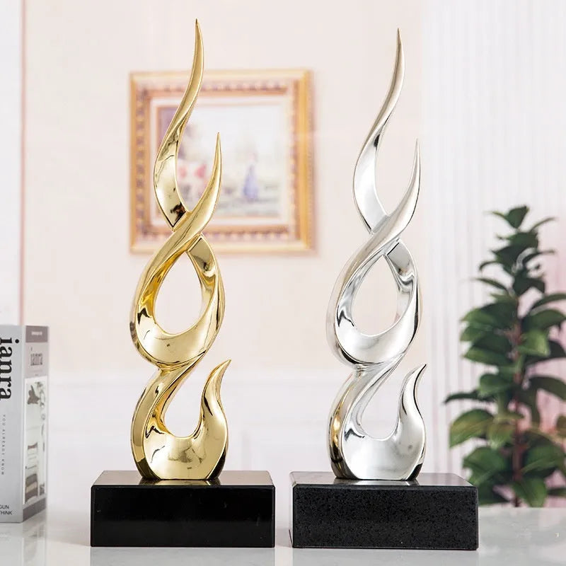 Large modern festival high-rise ornament in resin plastic with metallic gold finish