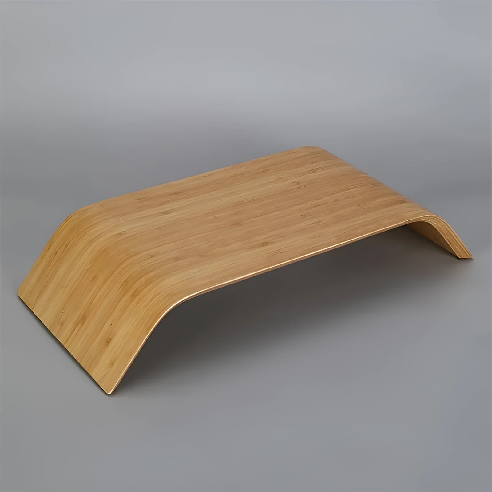 Walnut stability bracket laptop stand in bamboo leather colour, 23x51x9cm, on a desk