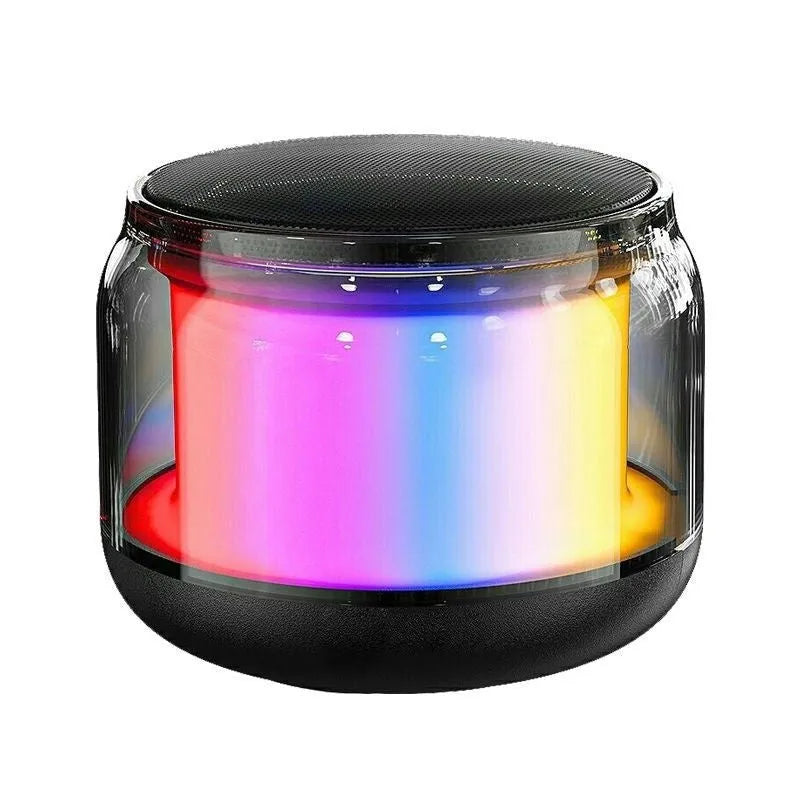 Black coloured glaze gun-shaped Bluetooth speaker with card slot on desktop