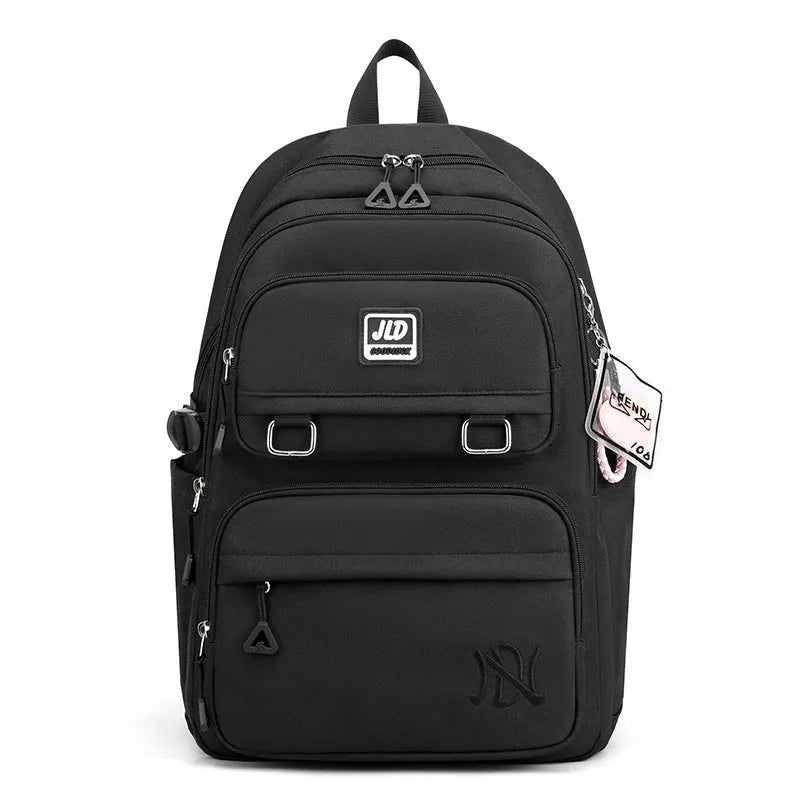 Large capacity nylon school backpack for girls with curved backplate, shown in a colour or print option.