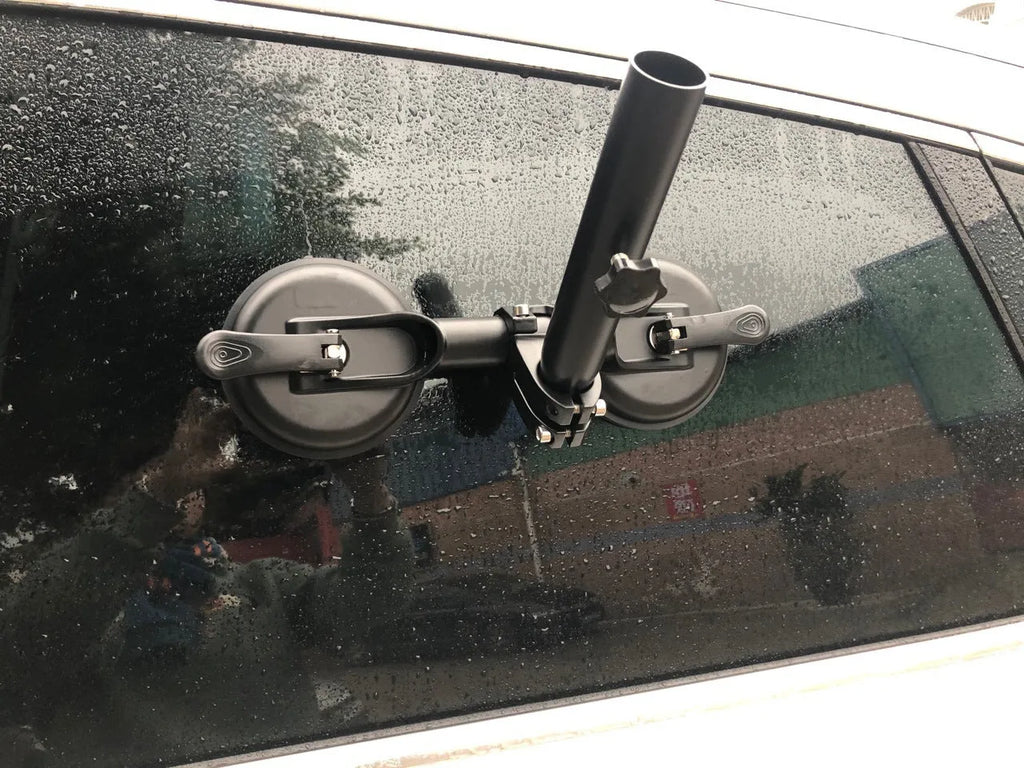 Black ABS off-road car sucker base with a round rubber sucker for mounting flagpoles on vehicle glass.