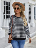 Black plaid stripe long sleeve pullover sweater laid flat, showing Japanese style pattern.