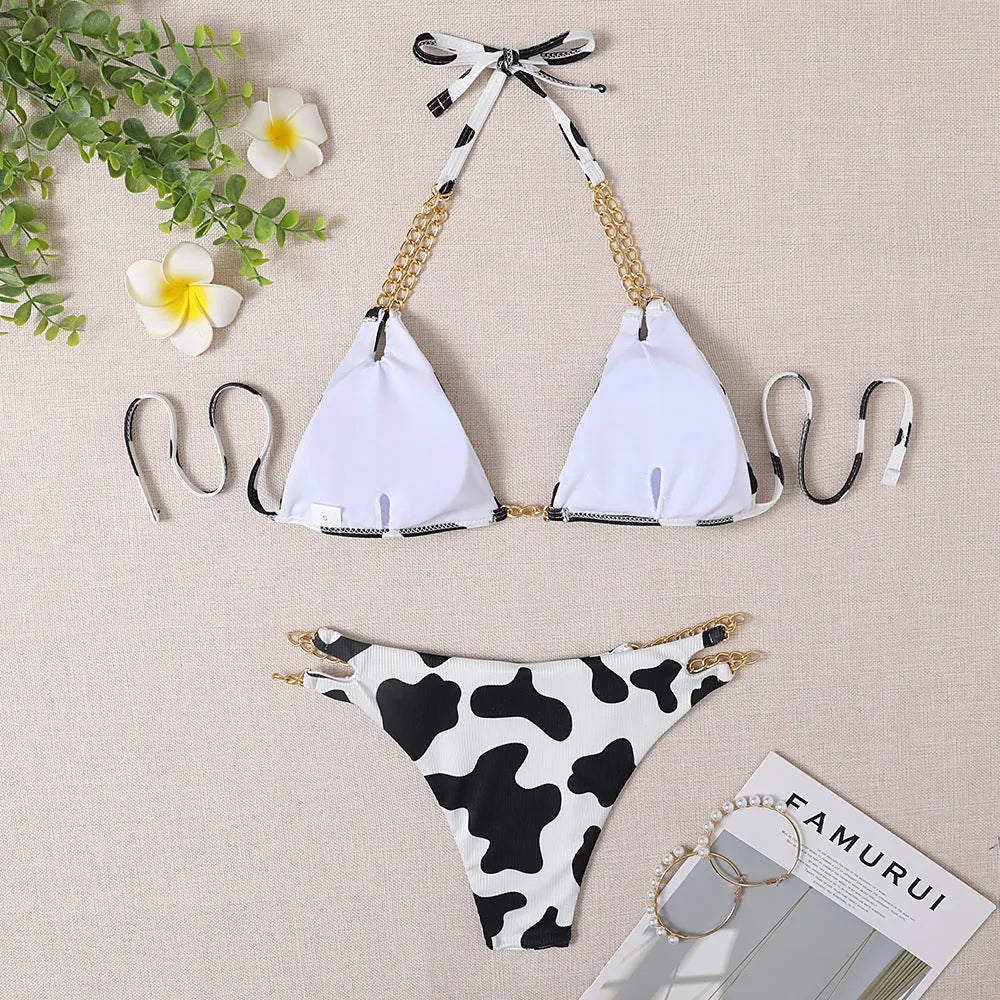 Women's two-piece bikini set with steel support top, polyester fabric, sizes S-XL, black floral or white, includes bra and panties.