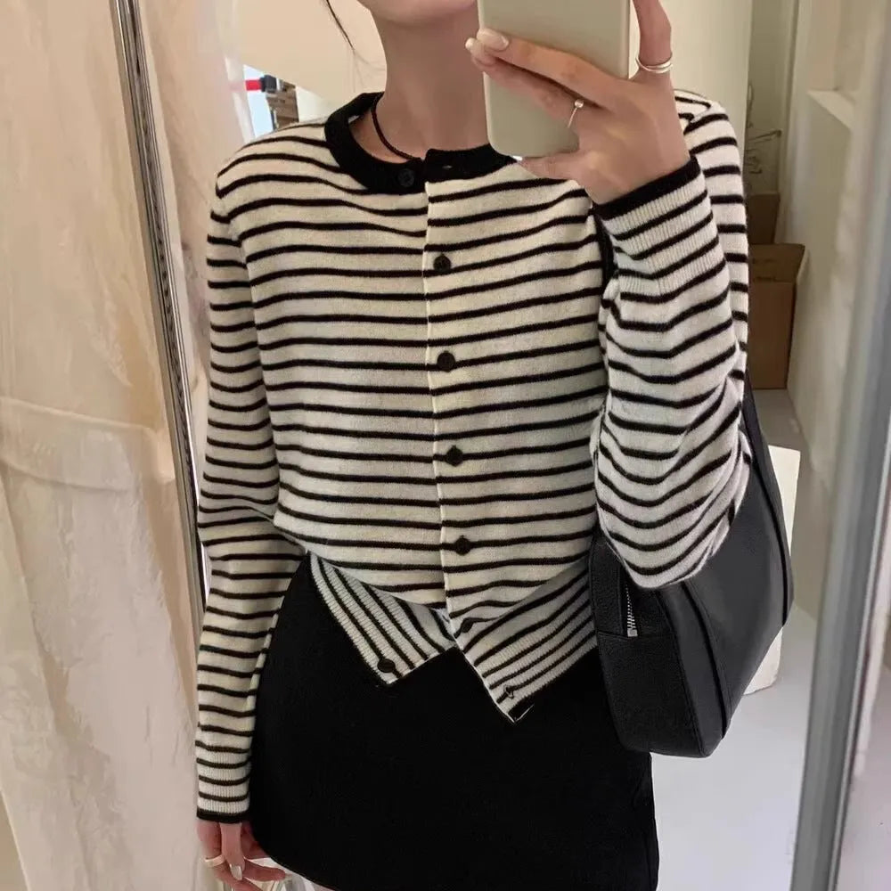 Dark grey and white striped slim fit cardigan coat for women with long sleeves.