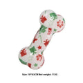 Printed bone-shaped dog toy in red and orange seasonal colours