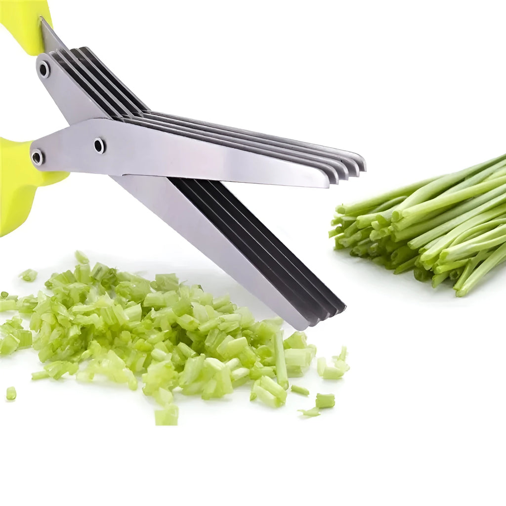 Stainless steel multi-layer kitchen scissors for cutting green onions and herbs on a chopping board.
