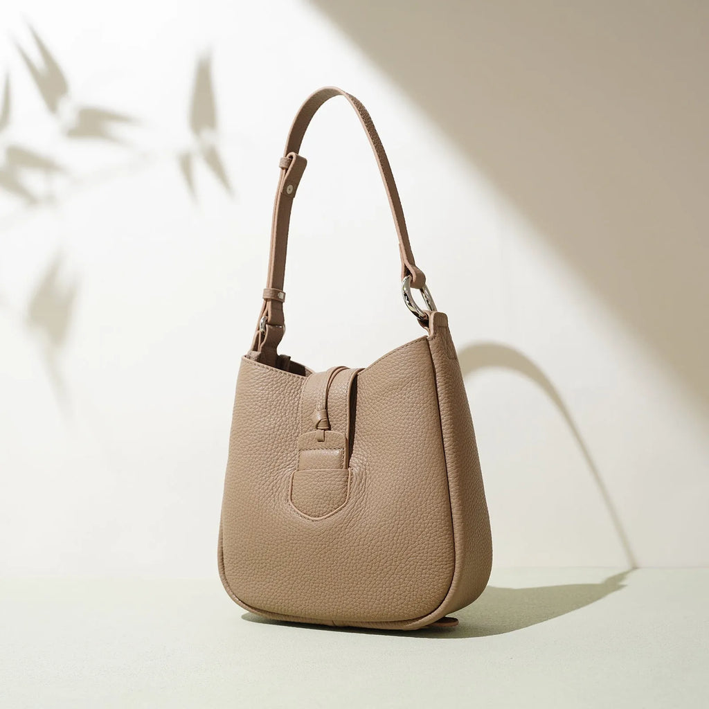Large capacity commuter soft leather crossbody bag in bucket shape with sewing line details