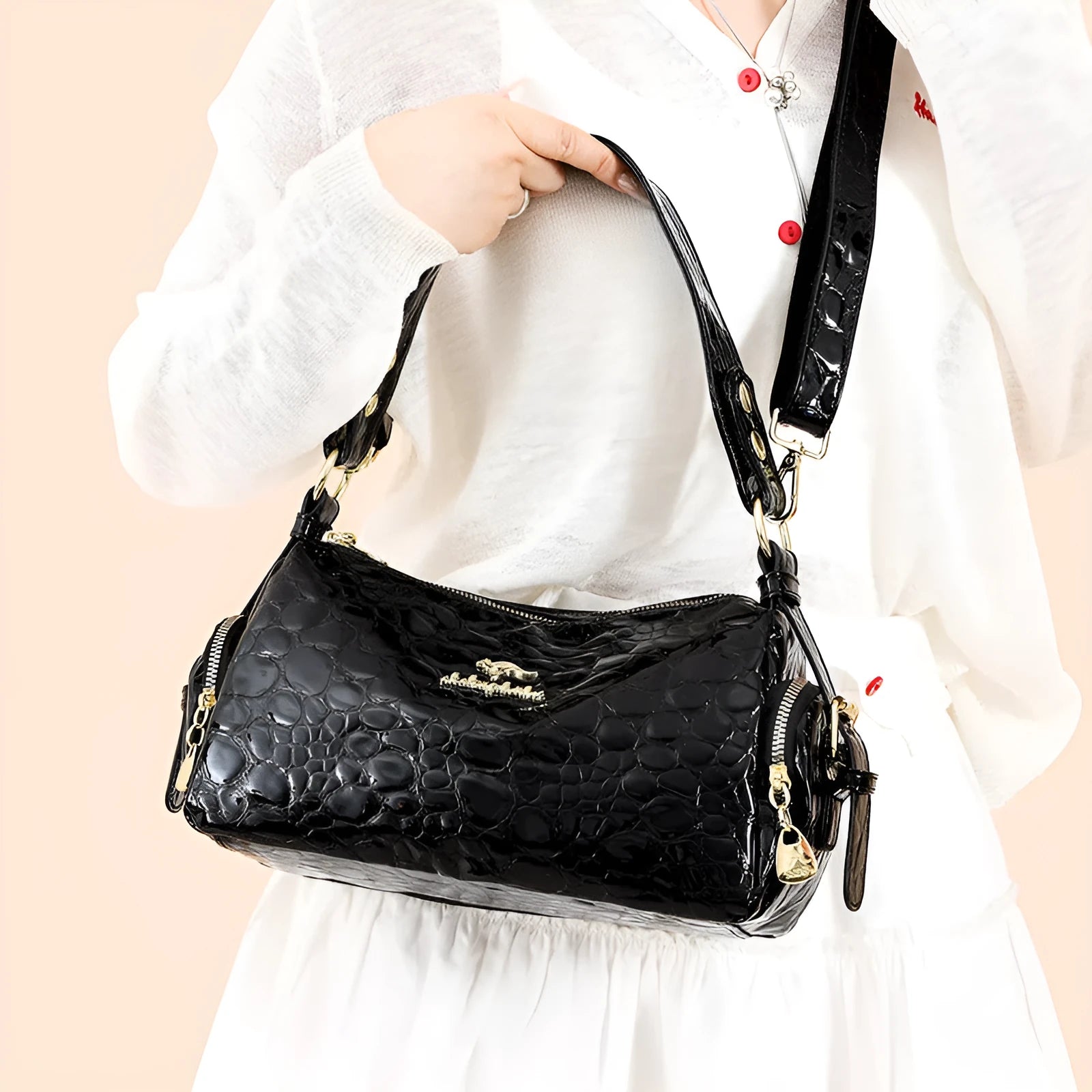 PU leather Boston pillow bag in khaki with stitched seams and stone pattern, double shoulder straps, internal pocket
