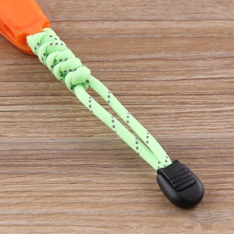 Fire survival whistle in black or orange, high impact plastic, 7.2cm x 2cm, with 10cm or 50cm lanyard
