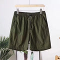 Men's straight-leg quick-drying sports shorts in chemical fibre blend fabric