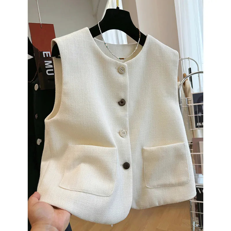 Women's sleeveless bandage vest in milky white with round neckline and fitted silhouette