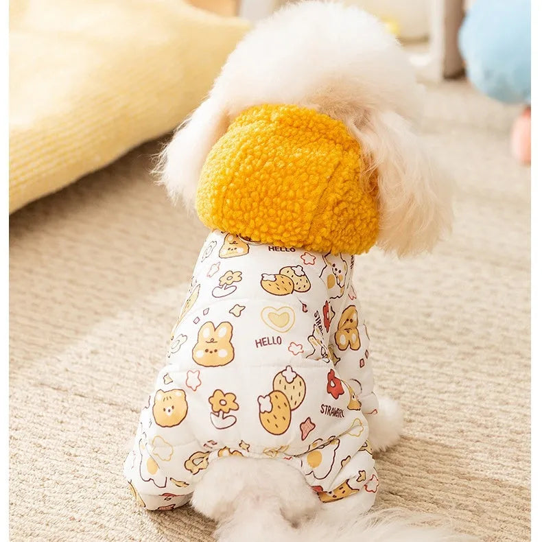 Yellow quilted cotton four-legged dog coat with sherpa hood and bear print on white background