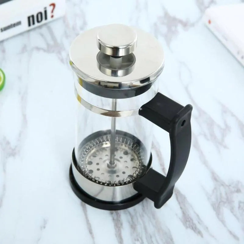 Compact manual pour-over coffee maker with glass and stainless steel construction, showing 350ml capacity