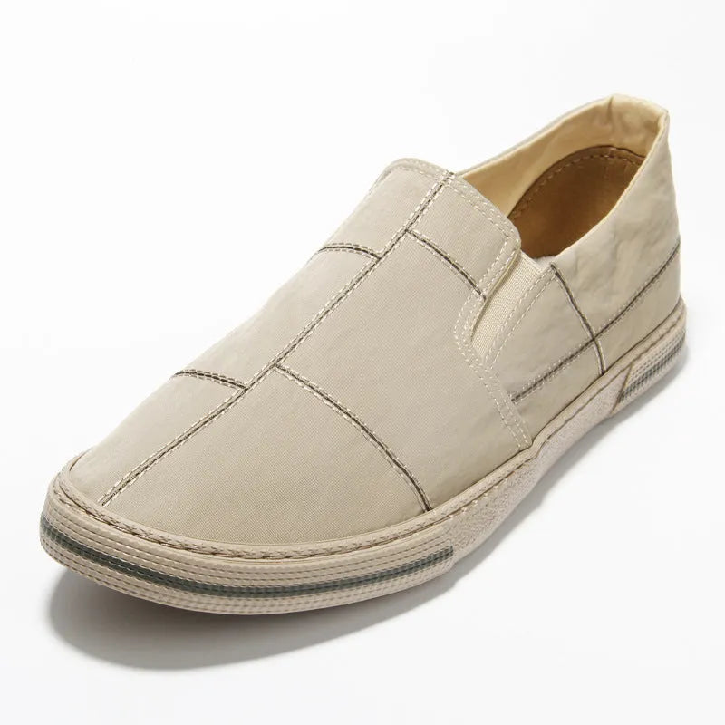 Men's low-top slip-on canvas casual trainers in multiple colours on a white background