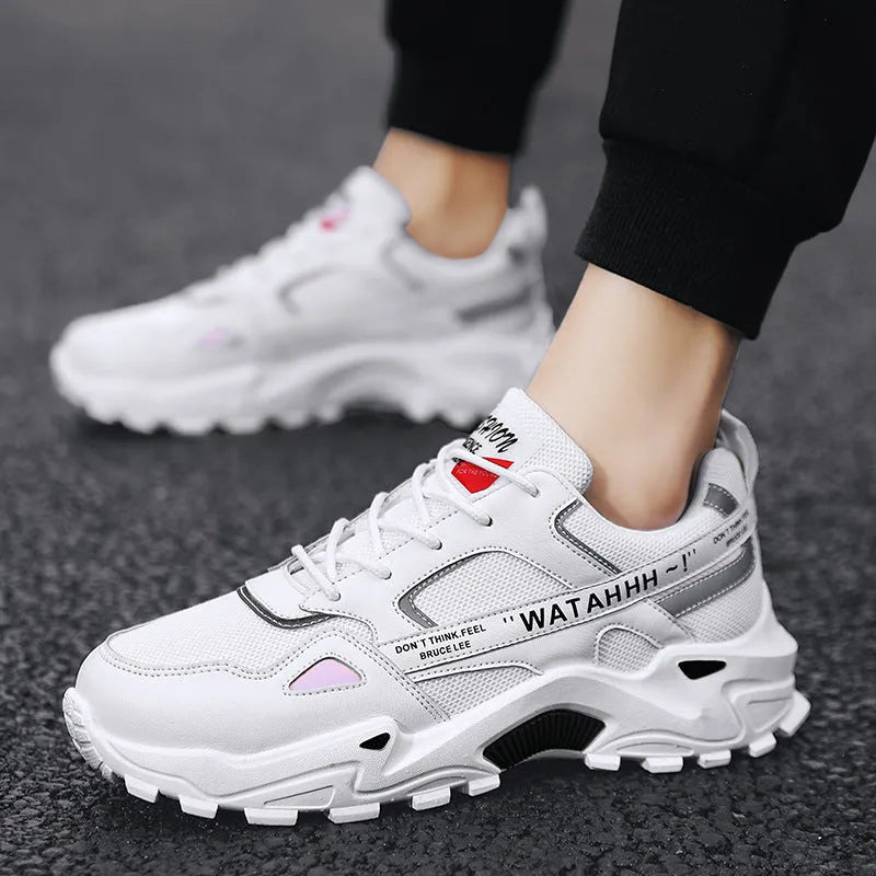 Men's breathable casual sneakers in black white colour-blocked pattern with lace-up front