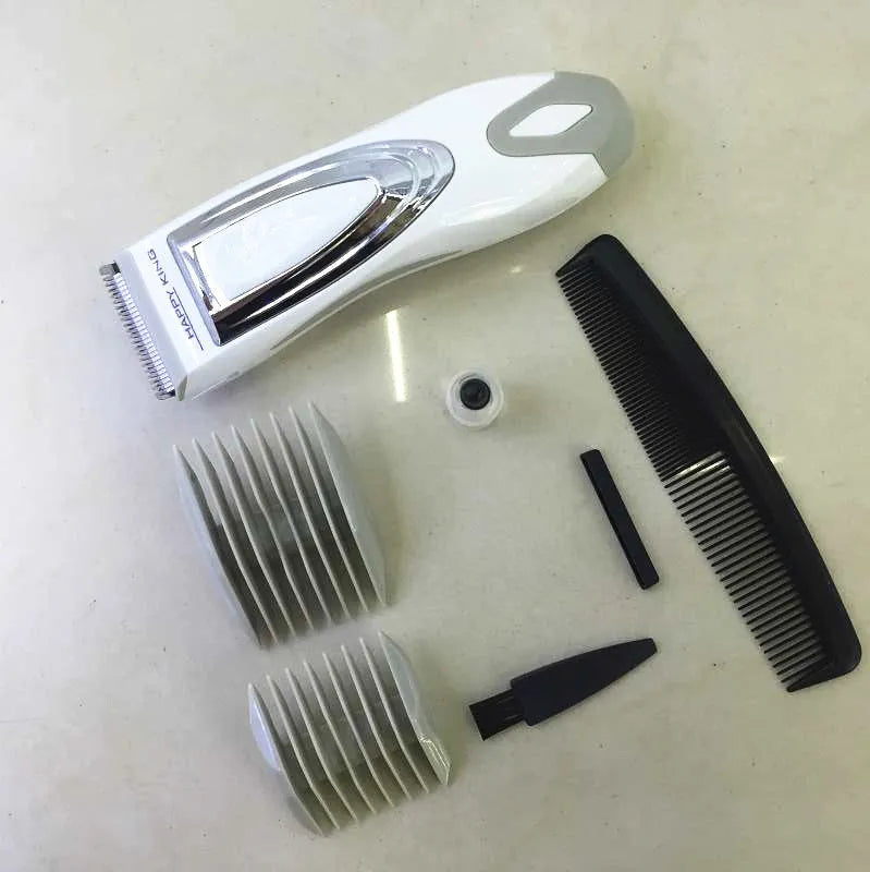 Children's barber scissors set with comb, limit combs, oil bottle, and brush in white